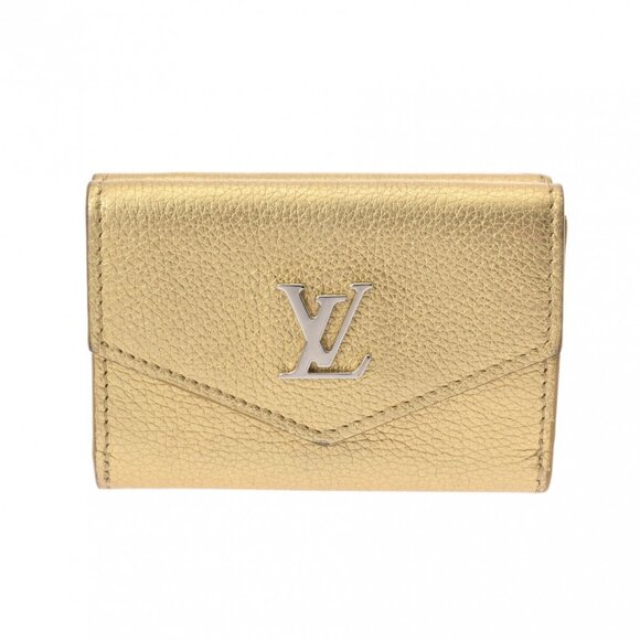 LOUIS VUITTON Gold purse - Picture 1 of 12